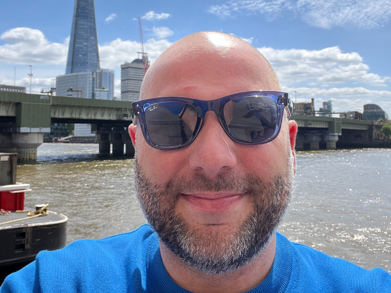 a picture of a man wearing sun glasses 