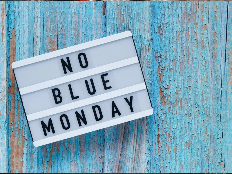 a picture of a sign on a blue painted table