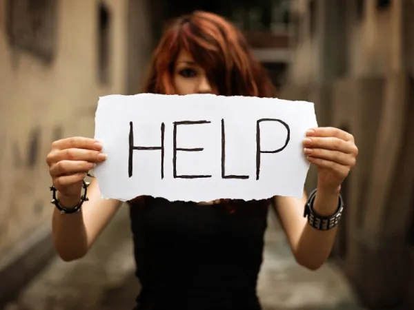 a picture of a woman asking for help