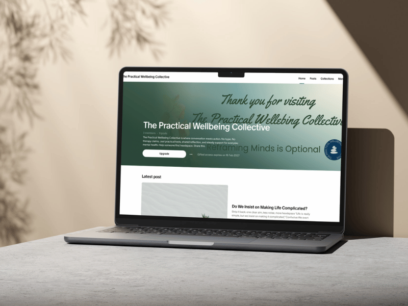 A picture of a macbook showing a website